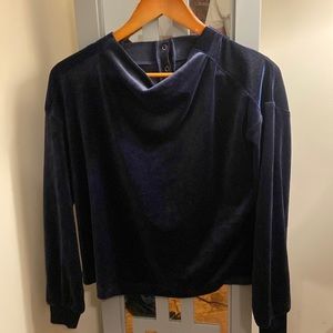 Navy Velour sweatshirt with ribbed shoulders and cuffs.